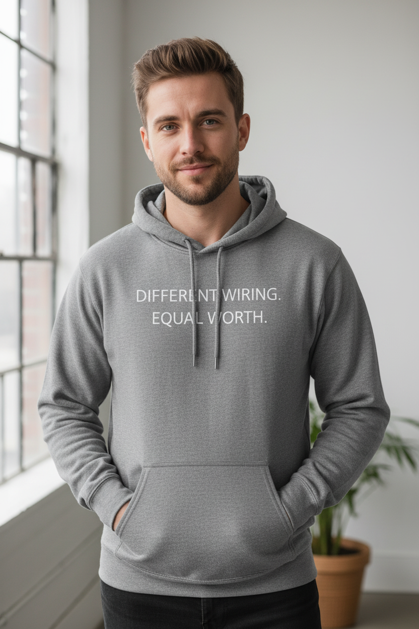 Man wearing Different Wiring Equal Worth graphite heather neurodivergent hoodie