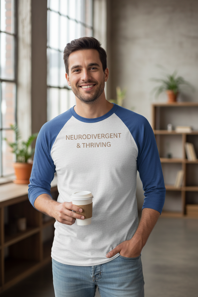 Man wearing Neurodivergent and Thriving white raglan tee with tahiti blue sleeves