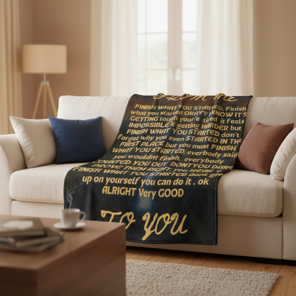 Premium Sherpa blanket draped over cozy sofa showing printed front side