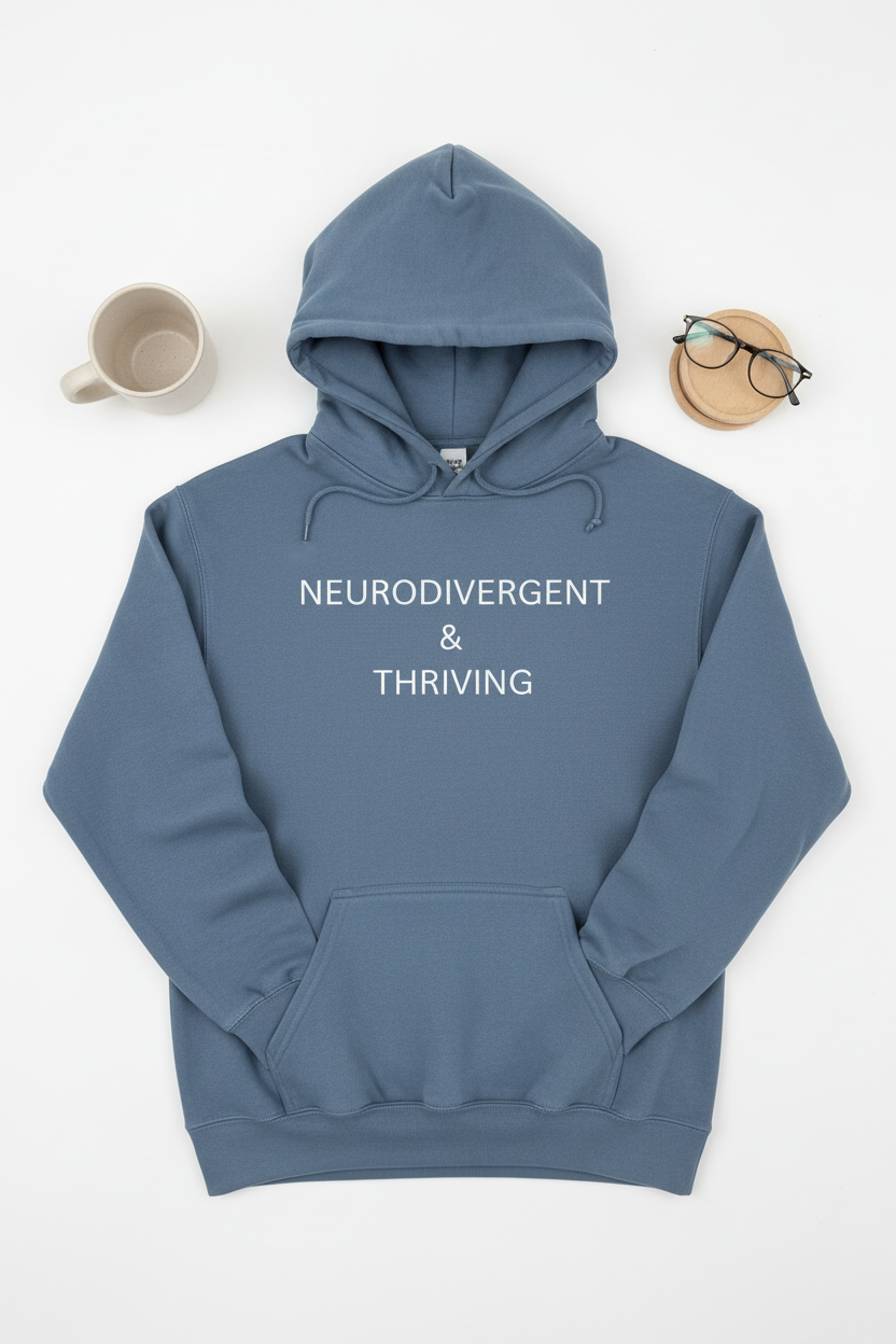 Flat lay of Neurodivergent and Thriving blue jean garment-dyed hoodie